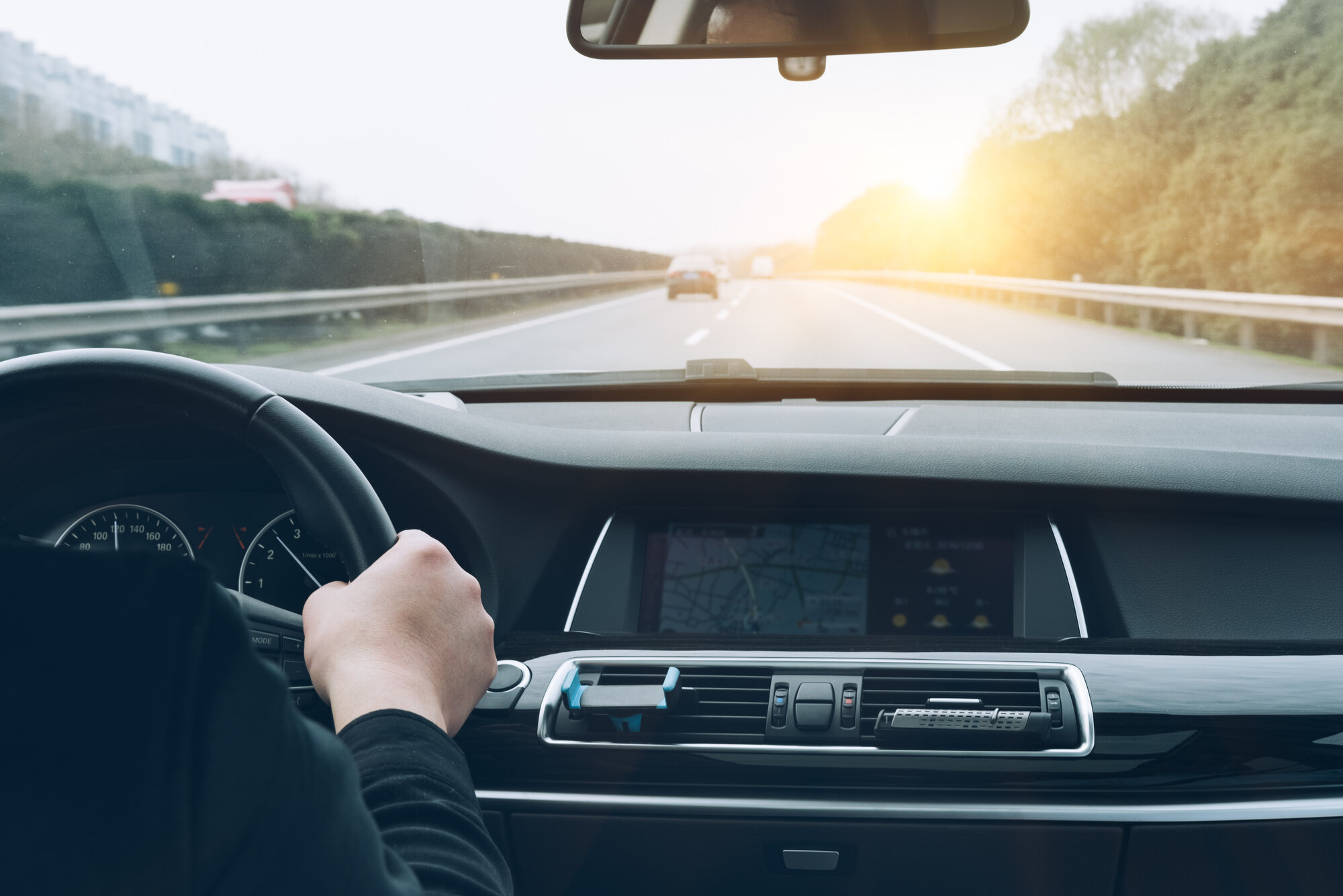 man-driving-car-from-rear-view man-driving-car-from-rear-view